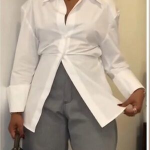 Elegant White Women's Waist-length long-sleeved solid color shirt.